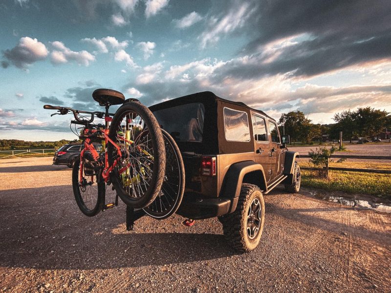 2 bikes on a trunk bike rack on a jeep